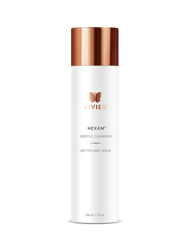 A tall, white bottle of Vivier Hexam Gentle Cleanser with a metallic copper cap and the Vivier butterfly logo. The bottle indicates "150 ml | 5 fl oz" at the bottom.